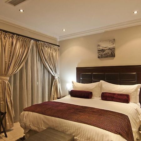 L'Eola Suites Abudża Pokój zdjęcie